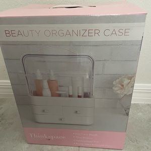 Beauty organizer case with clear top and three drawers